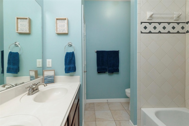 4953 Van Zandt Dr, Fort Worth, TX 76244 - bathroom featuring a sink, double vanity, baseboards, toilet, and tile patterned flooring