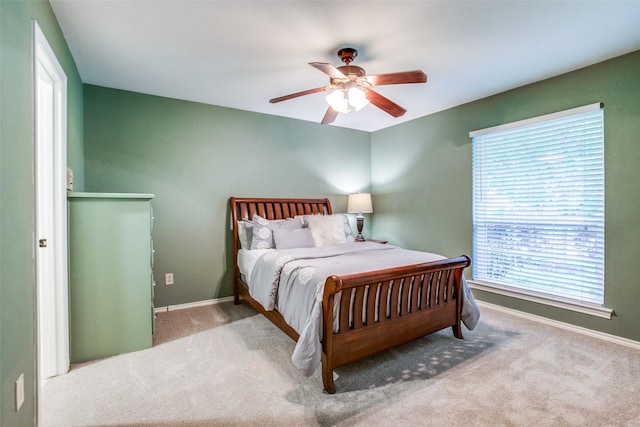 7215 Hillwood Ln, Dallas, TX 75248 - bedroom featuring multiple windows, carpet, and baseboards