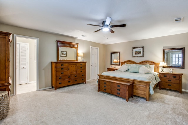 7215 Hillwood Ln, Dallas, TX 75248 - bedroom with light colored carpet, a ceiling fan, and baseboards