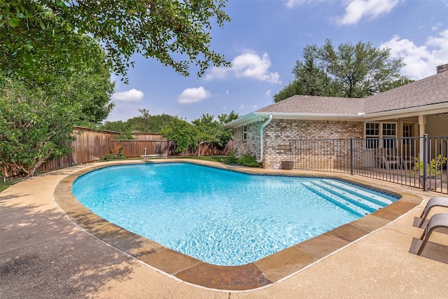 7215 Hillwood Ln, Dallas, TX 75248 - view of pool featuring a fenced backyard, a patio area, and a diving board