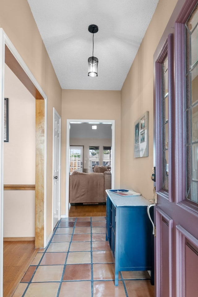 corridor with baseboards