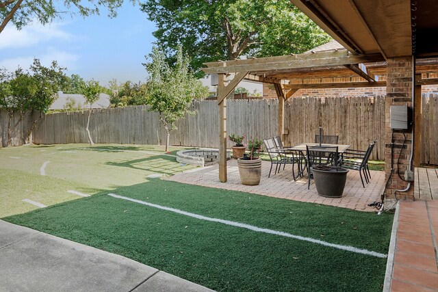 view of yard with a pergola, a patio, and a fenced backyard