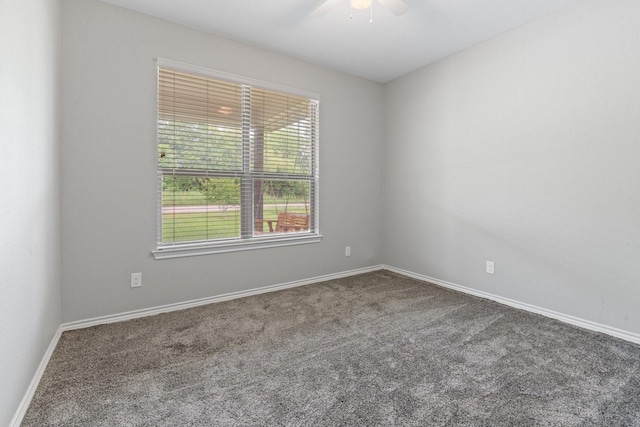 305 S 1st St, Grandview, TX 76050 - empty room featuring a ceiling fan, baseboards, and carpet