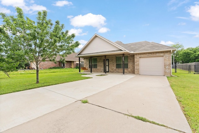 305 S 1st St, Grandview, TX 76050 - single story home featuring a garage, fence, covered porch, a front yard, and driveway