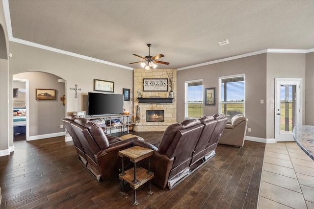4339 Paige Dr, Caddo Mills, TX 75135 - living room with hardwood / wood-style flooring, crown molding, ceiling fan, baseboards, and a fireplace