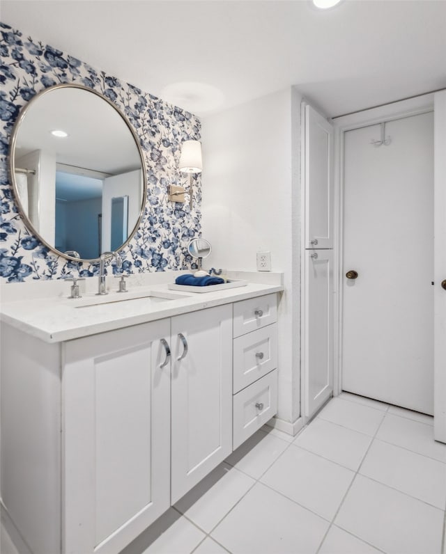 bathroom featuring vanity and tile patterned flooring