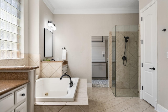 full bath featuring ornamental molding, tile patterned floors, a shower stall, and vanity