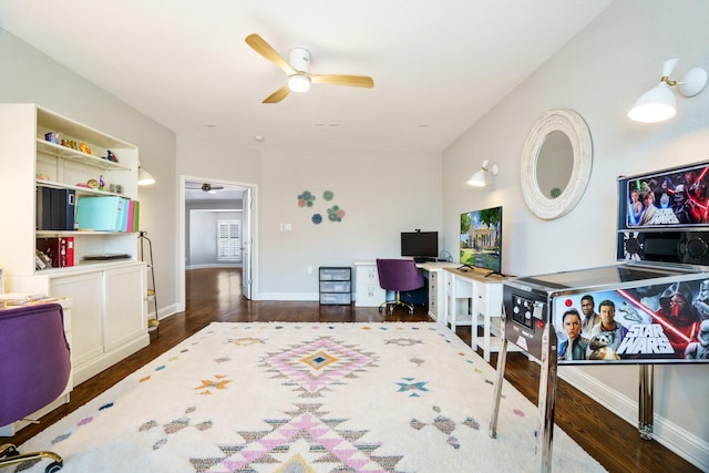 bedroom featuring wood finished floors and baseboards