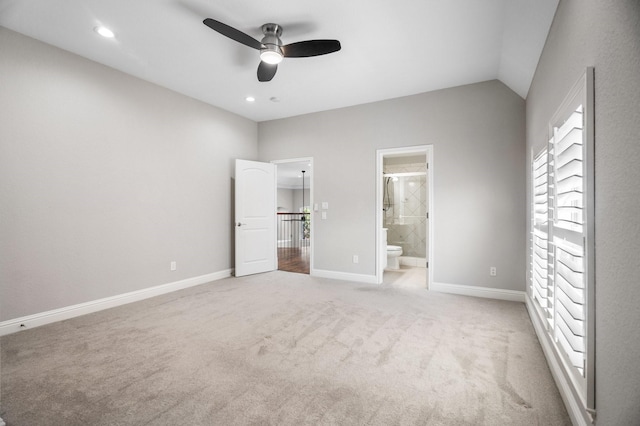 unfurnished bedroom with baseboards, ensuite bath, recessed lighting, and carpet floors