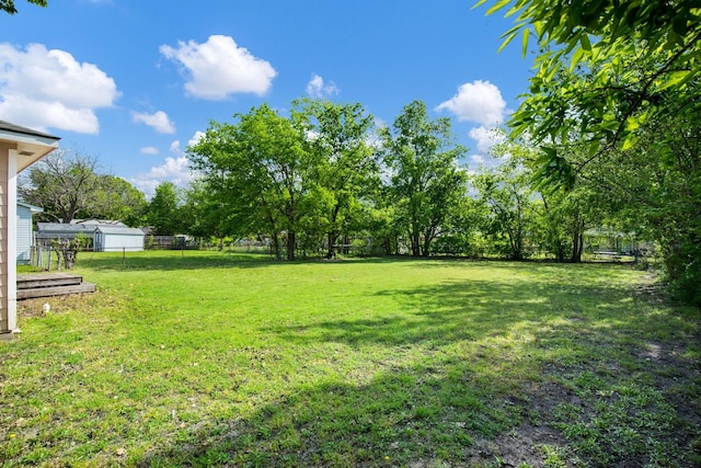 view of yard featuring fence