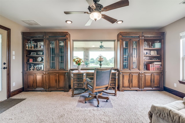 carpeted office space with recessed lighting, a ceiling fan, visible vents, and baseboards