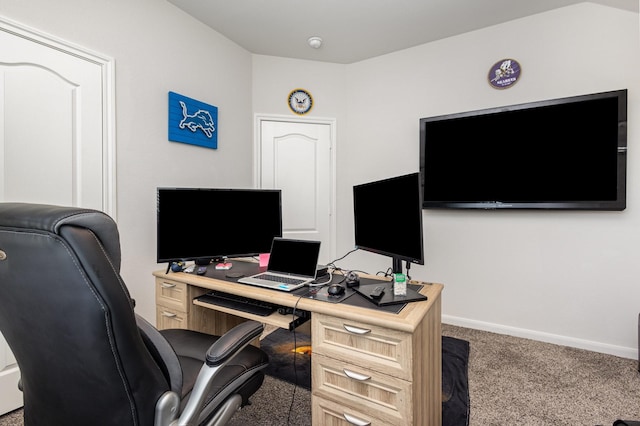 carpeted office space with baseboards