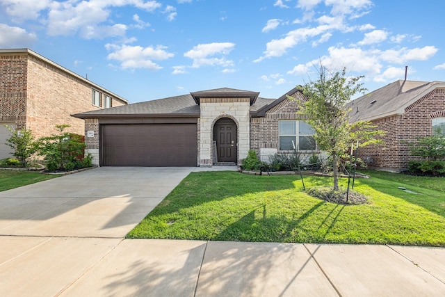 view of front facade featuring a garage, driveway, a front lawn, and stone siding