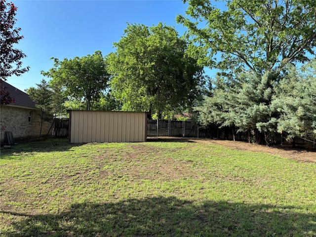 207 Shary St, Aledo, TX 76008 - view of yard with an outbuilding, a storage shed, and a fenced backyard