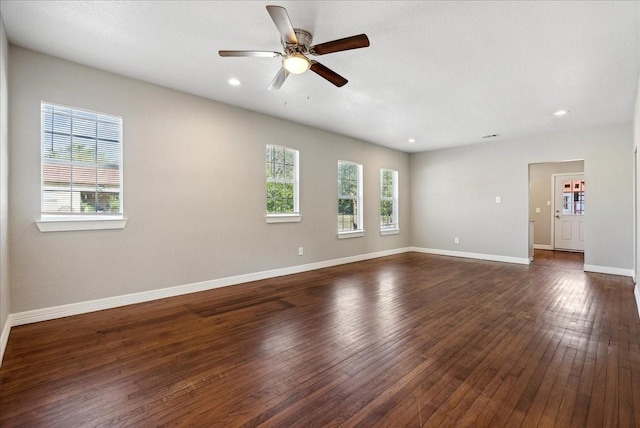 unfurnished room with baseboards, recessed lighting, a ceiling fan, and dark wood-type flooring