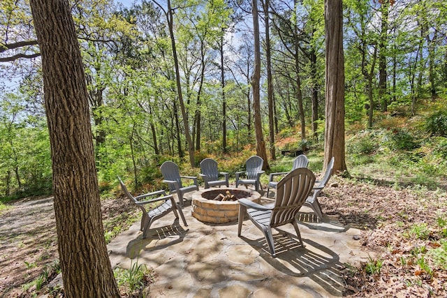view of patio with a fire pit