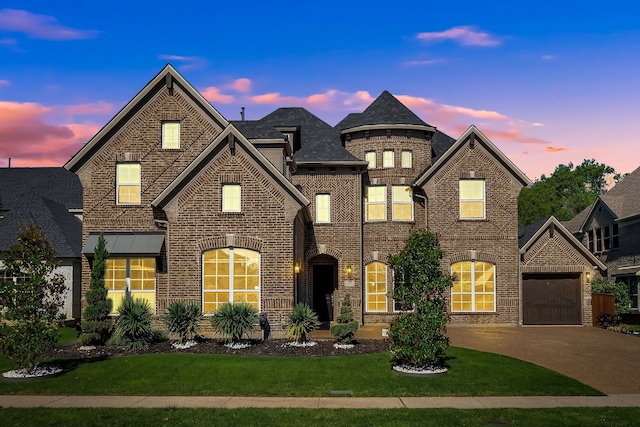 509 Basilica Ln, Mckinney, TX 75071 - view of front of property featuring brick siding, concrete driveway, a yard, and an attached garage