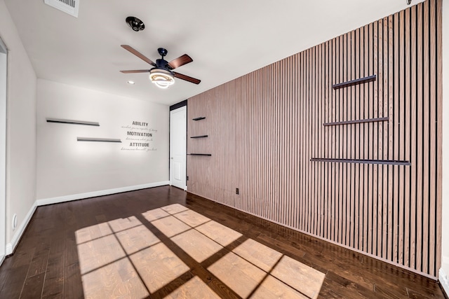 509 Basilica Ln, Mckinney, TX 75071 - empty room featuring a ceiling fan, wood finished floors, and baseboards