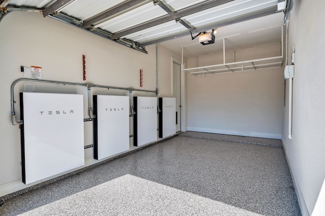 509 Basilica Ln, Mckinney, TX 75071 - garage with baseboards and a garage door opener