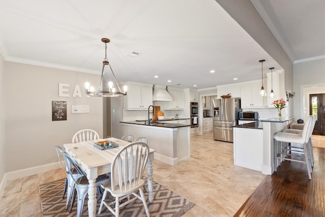 dining area featuring crown molding, a chandelier, visible vents, baseboards, and recessed lighting