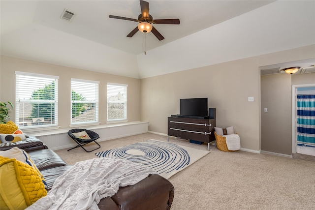 carpeted living area featuring visible vents, ceiling fan, lofted ceiling, and baseboards