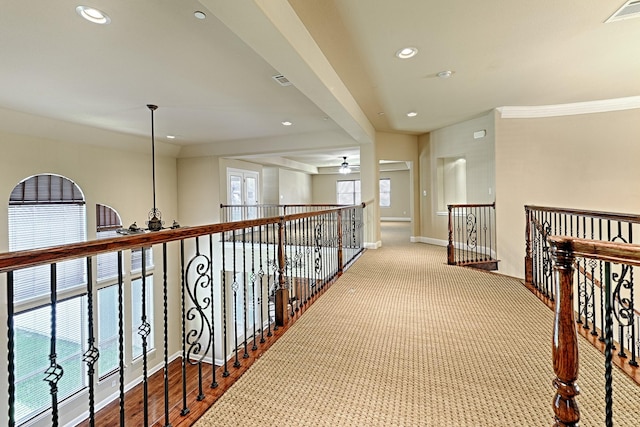 hall with an upstairs landing, visible vents, recessed lighting, and baseboards