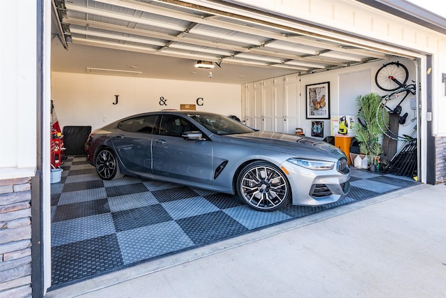garage featuring a garage door opener