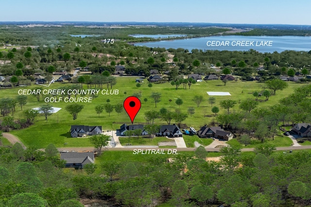 drone / aerial view featuring a water view and a residential view