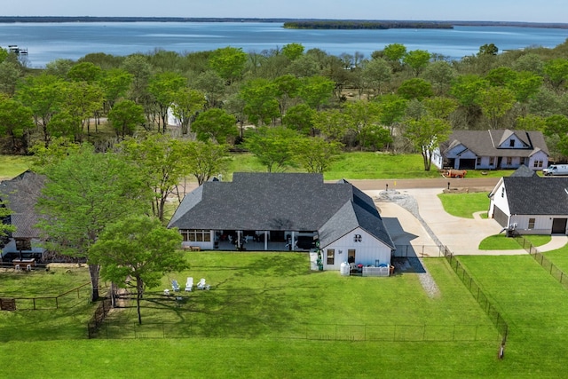 birds eye view of property featuring a water view