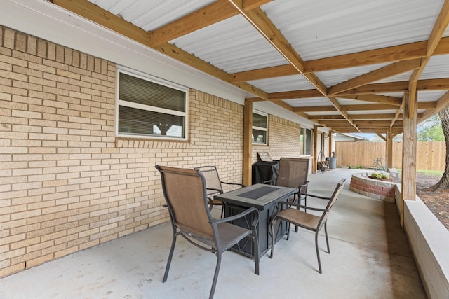 view of patio / terrace with fence and outdoor dining space