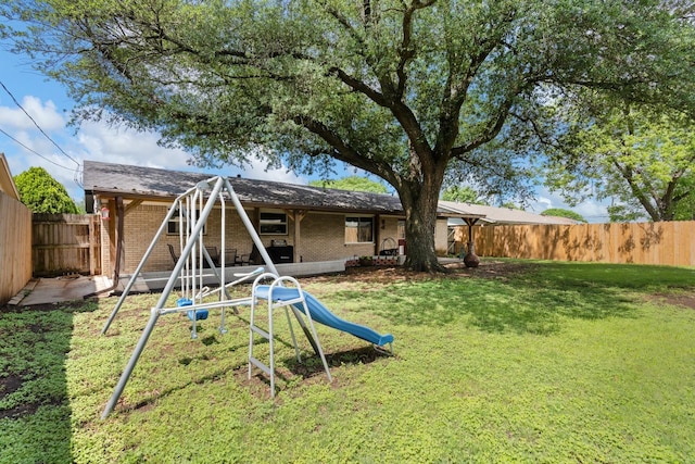 view of yard featuring a fenced backyard
