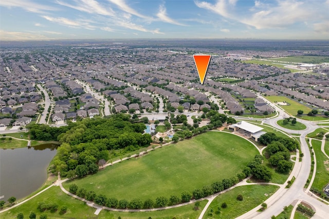 aerial view with a residential view and a water view