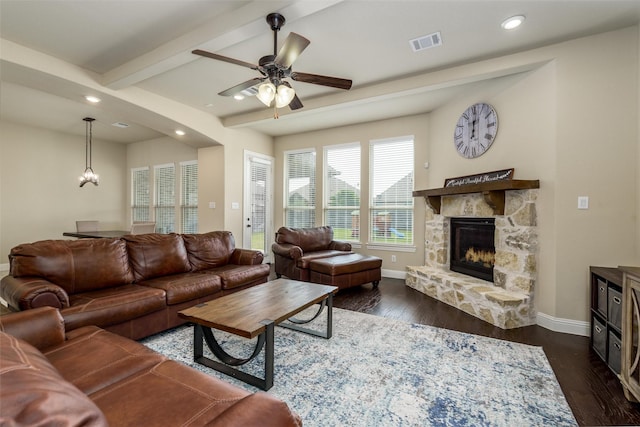 living area with visible vents, dark wood-style flooring, a fireplace, baseboards, and recessed lighting
