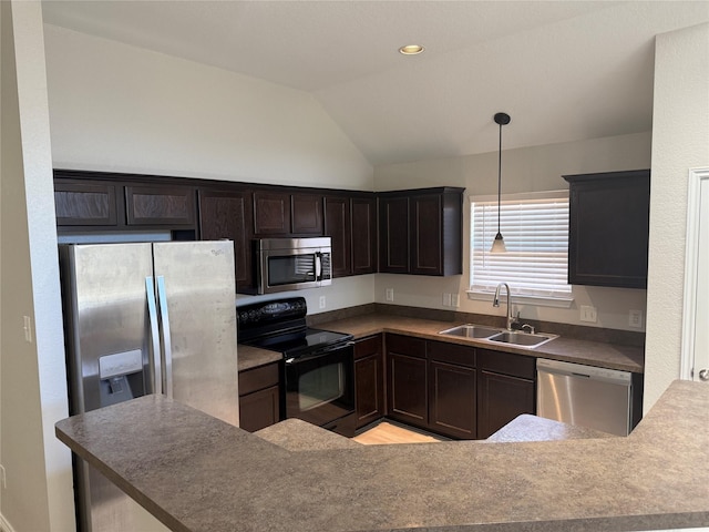 kitchen with decorative light fixtures, appliances with stainless steel finishes, vaulted ceiling, dark brown cabinets, and a sink