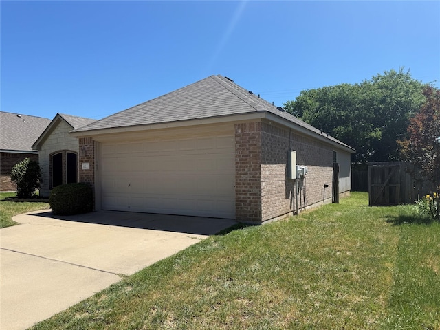 view of home's exterior with brick siding, a lawn, driveway, roof with shingles, and an attached garage