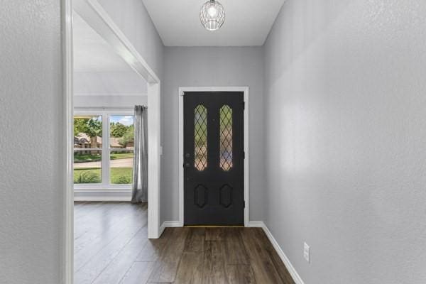 764 Cardinal Ln, Coppell, TX 75019 - foyer with wood finished floors and baseboards