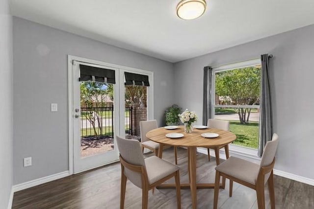 764 Cardinal Ln, Coppell, TX 75019 - dining space featuring baseboards and wood finished floors
