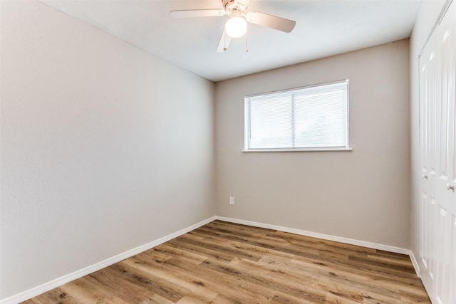 1601 Winderemere Dr, Arlington, TX 76014 - empty room featuring baseboards, a ceiling fan, and light wood-style floors