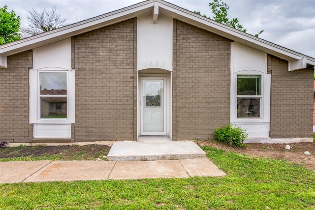 1601 Winderemere Dr, Arlington, TX 76014 - view of front facade with brick siding