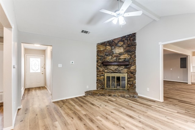 1601 Winderemere Dr, Arlington, TX 76014 - unfurnished living room with ceiling fan, visible vents, a fireplace, wood finished floors, and baseboards