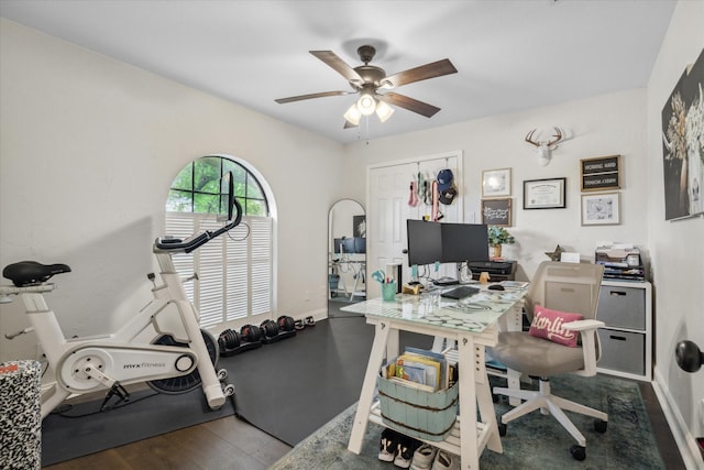 office with wood finished floors, ceiling fan, and baseboards
