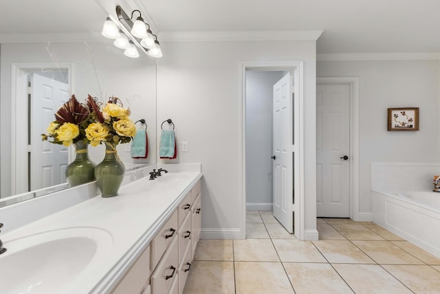 bathroom featuring crown molding, tile patterned flooring, and a sink