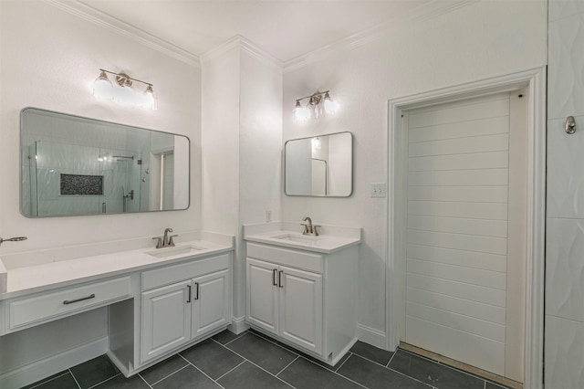 full bath featuring a shower stall, crown molding, tile patterned flooring, and a sink