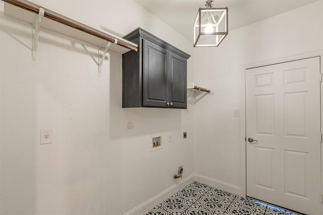 laundry room with cabinet space, washer hookup, electric dryer hookup, baseboards, and gas dryer hookup