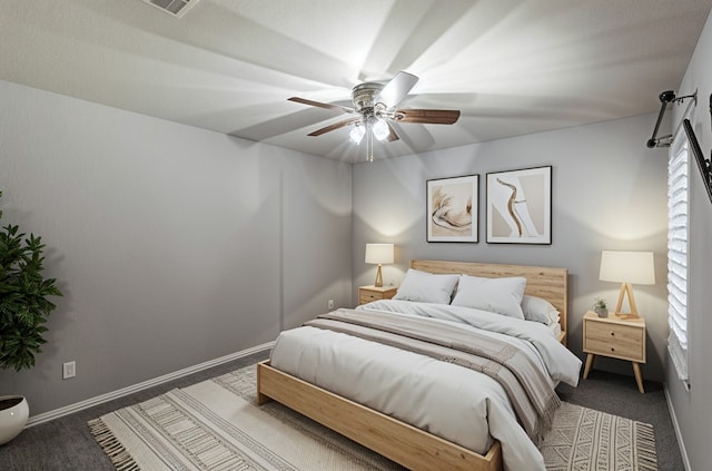 carpeted bedroom with ceiling fan