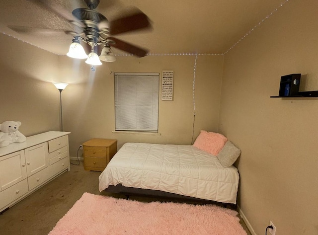 1207 Dearborn Dr, Richardson, TX 75080 - carpeted bedroom with baseboards and a ceiling fan
