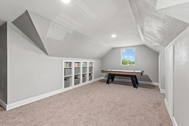 2214 Norwood St, Sherman, TX 75092 - game room with a textured ceiling, carpet, baseboards, built in features, and vaulted ceiling