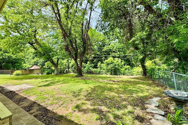 view of yard featuring a fenced backyard