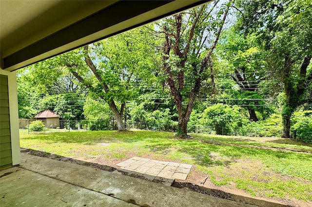 view of yard featuring a patio and a fenced backyard