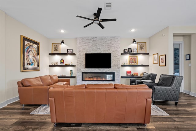 4801 Park View Pl, Arlington, TX 76005 - living area with dark wood-style flooring, a fireplace, ceiling fan, visible vents, and baseboards